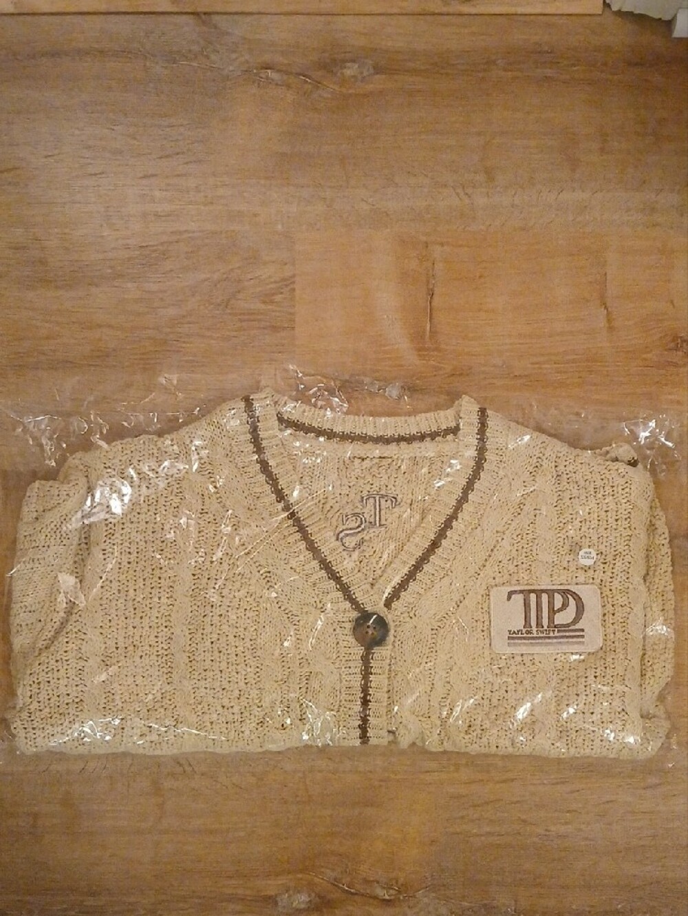 Taylor Swift Ladies Cream Cable Knit Cardigan with Brown Trim & Embroidery. - Picture 10 of 11